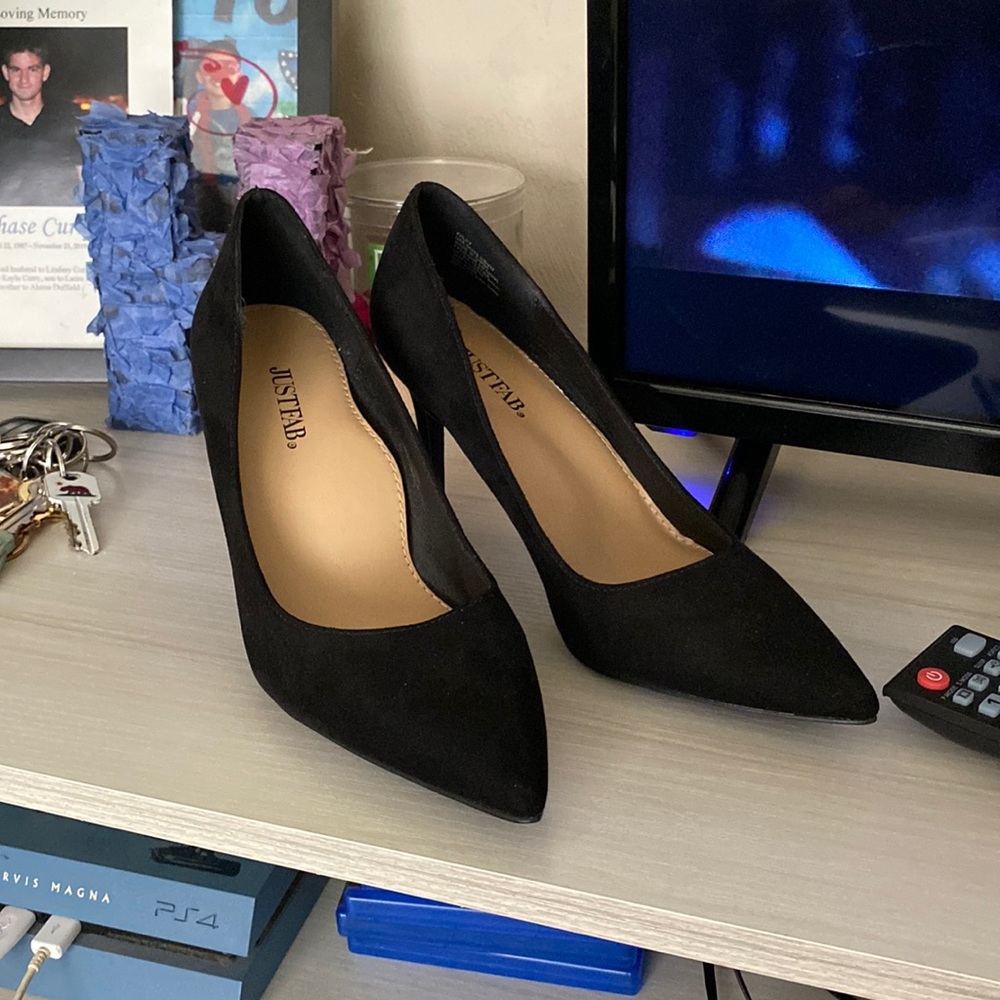 Black classy high heels. No longer needed.